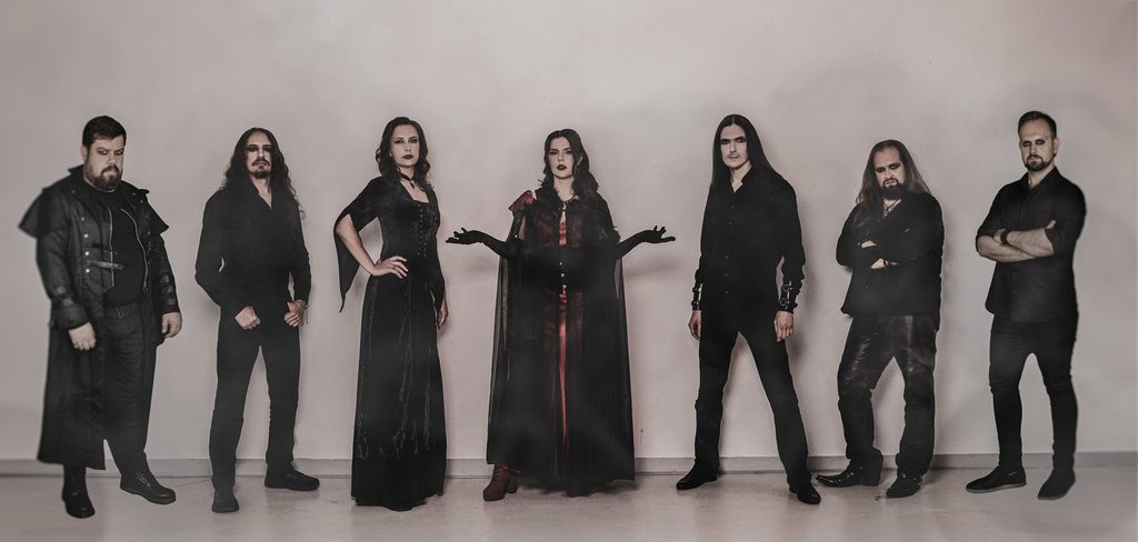 Belle Morte, band photo 2026 (red curtain). Photo by Marta Zajac-Krysiak.